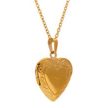 Load image into Gallery viewer, Close-up of 18K gold plated stainless steel heart locket necklace with carved openable photo pendant.