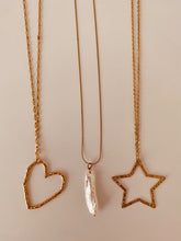 Load image into Gallery viewer, Embrace timeless elegance with this delicate stainless steel necklace, showcasing a stunning irregular long freshwater pearl charm. The unique shape of the pearl adds a touch of natural beauty, while the sleek chain brings a modern edge to your look. Perfect for layering or as a statement piece, this necklace effortlessly combines sophistication with a subtle, organic flair.