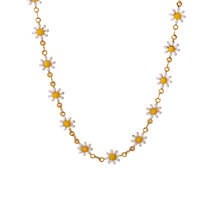 Load image into Gallery viewer, Add a pop of color and charm to your look with this stunning 18k gold plated stainless steel daisy chain choker necklace. Featuring vibrant, colorful enamel daisies, this playful yet elegant piece is perfect for adding a cheerful touch to any outfit. Crafted from durable stainless steel with a radiant gold finish, it offers long-lasting beauty and tarnish resistance. Lightweight and versatile, this necklace is an ideal accessory for both casual and special occasions, making it a delightful addition to your