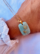 Load image into Gallery viewer, Gold plated necklace featuring a natural amazonite pendant with celestial symbols.