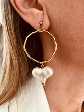 Load image into Gallery viewer, Acrylic heart drop earrings with stainless steel hollow circle shown from front angle highlighting modern geometric statement jewelry