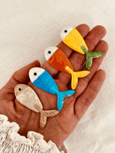 Load image into Gallery viewer, Colourful fish earrings photographed in natural light.