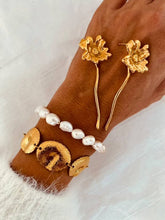 Load image into Gallery viewer, Luxury gold bracelet with handcrafted-inspired finish.