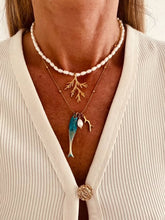 Load image into Gallery viewer, Freshwater pearl necklace styled with other Bernat Jewelry ocean-inspired necklaces.
