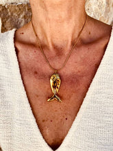 Load image into Gallery viewer, Cortie gold fish necklace with an elegant sculptural fish pendant worn on a fine gold chain.