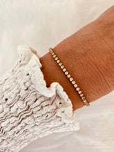 Load image into Gallery viewer, Crystal tennis bracelet in rose gold and silver stainless steel displayed in clean product view