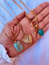Load image into Gallery viewer, Elegant heart medallion necklace styled with Bernat Jewelry collections.