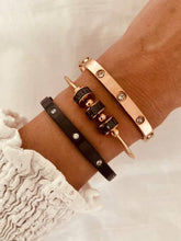 Load image into Gallery viewer, Zircon bracelet styled with outfit on wrist highlighting versatile evening jewelry