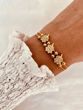 Load image into Gallery viewer, Clover zircon bracelet styled with outfit demonstrating elegant everyday jewelry style