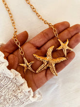 Load image into Gallery viewer, Close-up of the textured starfish details on the LUNA necklace.