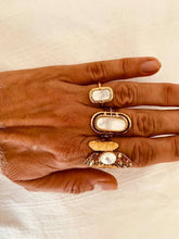 Load image into Gallery viewer, Detailed view of the AFON pearl ring emphasizing the handcrafted textured finish, polished gold surface and luminous freshwater pearl.