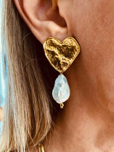 Učitaj sliku u preglednik galerije, NIKA heart and baroque pearl earrings worn on the ear showcasing timeless elegance and romantic styling.