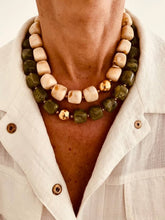 Učitaj sliku u preglednik galerije, Layered styling featuring the IZZA Cream Marble necklace paired with the Olive Marble version for a sophisticated contemporary look.