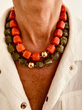 Učitaj sliku u preglednik galerije, IZZA Olive Marble necklace layered with the Coral Marble necklace, combining soft neutral tones with polished gold details.