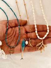Load image into Gallery viewer, Layered styling featuring the ASTRA blue starfish necklace.