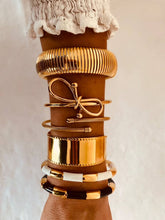 Load image into Gallery viewer, Open bangle layered with other bracelets showing modern stacking jewelry style