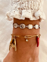 Load image into Gallery viewer, Close-up of bracelet capturing shine and textured design
