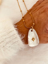 Load image into Gallery viewer, Elegant gold necklace with white mother of pearl pendant.