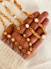 Load image into Gallery viewer, Bernat Jewelry LEAKENA necklace combining natural freshwater pearls with sculptural gold elements for a sophisticated statement design.