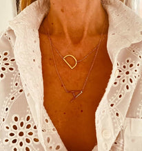 Load image into Gallery viewer, Custom two letter necklace styled on neckline demonstrating elegant everyday jewelry style