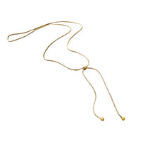 Load image into Gallery viewer, This lovely fashion necklace is made out of stainless steel and is real gold plated. Its beautiful, elegant chain is adorned with two small balls on its end. The necklace is adjustable with a clasp in a shape of a little ball as well that makes the necklace even prettier. This interesting vintage necklace can be worn with an everyday outfit but also makes a great accessory for evening night out.