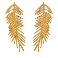 Load image into Gallery viewer, These long leaves statement stud earrings are a striking addition to any jewelry collection, crafted from durable, waterproof stainless steel in gold and silver tones. Featuring bold leaf designs, they bring a touch of nature-inspired elegance with a modern twist. Their large, eye-catching shape makes them a perfect statement piece, adding both style and sophistication to any outfit.