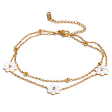 Load image into Gallery viewer, Add a touch of summer romance to your style with this exquisitely crafted gold anklet. Made from high-quality, gold-plated stainless steel, it features a delicate double-chain design. One chain is adorned with dainty gold beads, while the other is beautifully decorated with charming white flowers, creating a perfect balance of elegance and whimsy. With its secure lobster clasp and adjustable length, this anklet is the ideal accessory to enhance your summer look, adding a subtle yet sophisticated touch to yo