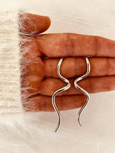 Load image into Gallery viewer, Modern sculptural wave earrings in silver.