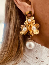 Load image into Gallery viewer, Floral pearl earrings styled with outfit emphasizing feminine vintage inspired fashion jewelry aesthetic