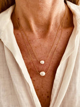 Load image into Gallery viewer, Layered pearl necklace worn on model styled with casual outfit demonstrating effortless elegance for everyday wear
