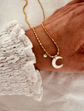 Load image into Gallery viewer, Gold moon pendant necklace with bead chain and white shell crescent front view