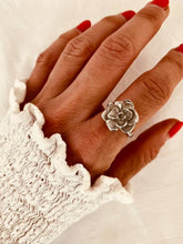 Load image into Gallery viewer, Hala vintage floral statement ring with sculpted flower design and luxurious gold-plated finish worn on hand