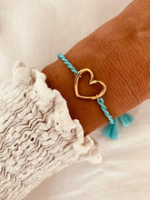 Load image into Gallery viewer, Women's friendship bracelet featuring an open heart gold-plated charm and adjustable cord