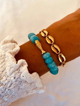 Load image into Gallery viewer, Turquoise bracelet with gold fish charm and ocean blue beads