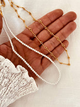 Load image into Gallery viewer, Secure stainless steel clasp and chain extension detail on elegant imitation pearl necklace for adjustable and comfortable fit.