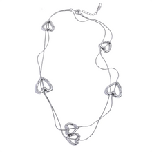 Load image into Gallery viewer, Elegant heart charm necklace in silver finishes on a long chain design