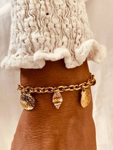 Load image into Gallery viewer, Margene coastal bracelet featuring textured shell charms on a gold-plated chain inspired by Mediterranean summers