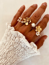 Load image into Gallery viewer, Minimalist gold tone flower ring durable stainless steel women’s jewelry