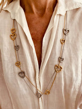 Load image into Gallery viewer, Minimalist outfit styled with long heart necklace for a clean modern look