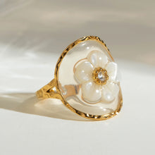 Load image into Gallery viewer, Women’s gold open ring with delicate flower encased in oval resin setting