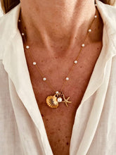 Load image into Gallery viewer, gold plated ocean pendant necklace worn on model elegant summer outfit accessory