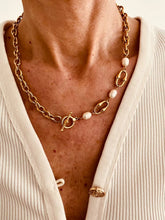 Load image into Gallery viewer, Woman wearing pearl chain necklace styled with an elegant outfit