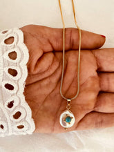 Load image into Gallery viewer, Front view of pearl necklace with turquoise charm and fine chain