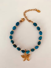 Load image into Gallery viewer, Turquoise bracelet with gold starfish charm and coastal summer aesthetic