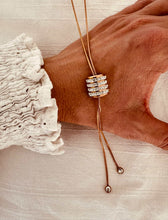 Load image into Gallery viewer, rose gold cylinder pendant necklace with cubic zirconia detail