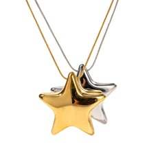 Load image into Gallery viewer, Close up of the star pendant highlighting smooth polished stainless steel surface and dimensional sculpted design for premium quality feel