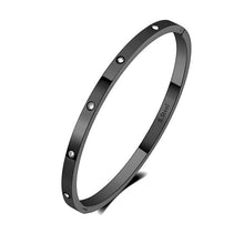 Load image into Gallery viewer, Black zircon bangle bracelet showcasing bold modern jewelry style