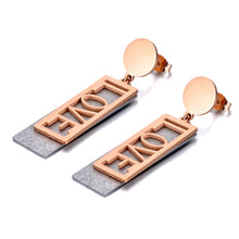 Load image into Gallery viewer, These fashionable stainless steel earrings are made in a rose gold colour or combination of silver and rose gold. They consists of a sanded rectangle and letters LOVE. Both, letters and rectangle are hanging on a circle.Earrings are three times gold plated and represent perfect and elegant touch to your day to day style. They have stud fastening.