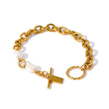 Load image into Gallery viewer, Side angle of gold pearl bracelet on wrist showing structure and natural pearl details
