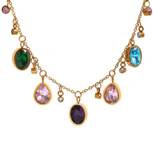 Load image into Gallery viewer, Close up of multicolor cubic zirconia pendants highlighting vibrant tones and polished gold frame settings